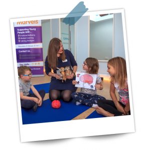 Karen using props whilst taking to children